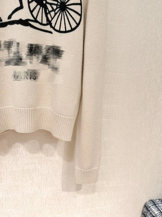 Carriage-knit sweater