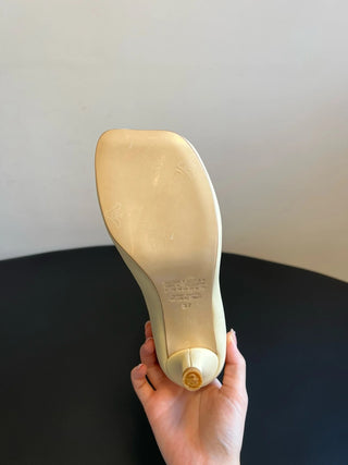 thigh-high leather horseshoe boots