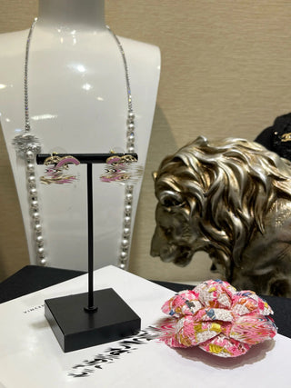 new pink enamel diamond pattern double C earrings