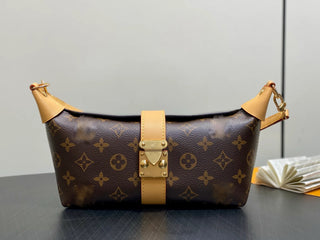 Vintage monogrammed underarm bag