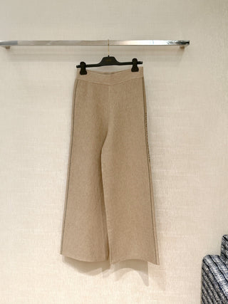 New ribbed cotton straight-leg trousers with monogram pattern.