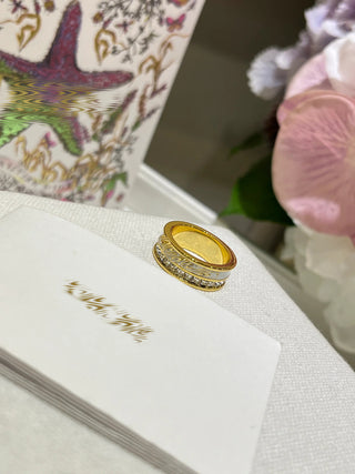 New white gold enamel ring with gold lettering and pavé diamonds