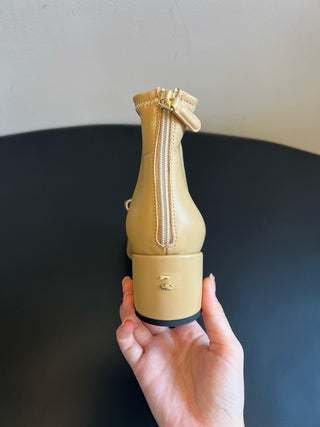 bow-embellished block-heeled ankle boots