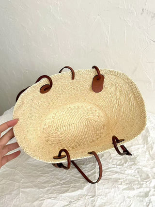 Small woven straw shopping basket, brown.