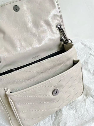 niki waxed leather cream medium