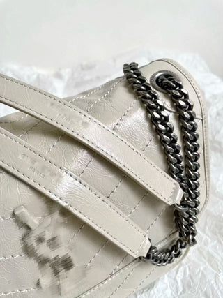 niki waxed leather cream medium