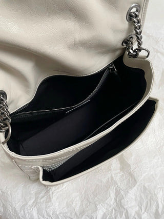 niki waxed leather cream medium