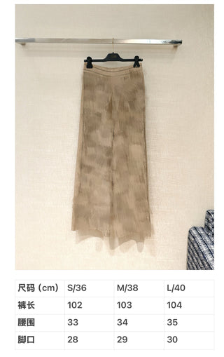 New ribbed cotton straight-leg trousers with monogram pattern.