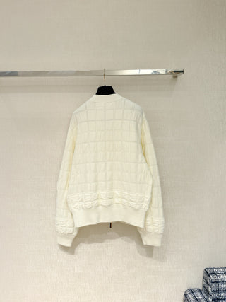 Chane* 25B Métiers d'Art collection new arrival: Stand-up collar zip-up baseball jacket with ribbon.