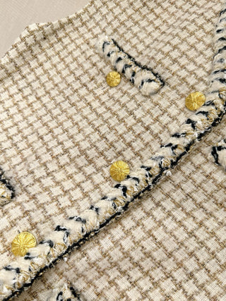 Chane* 25K lace vest features classic tweed trim with delicate chain lace accents and a silk lining.