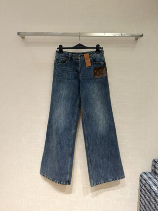 1v monogrammed leather jeans