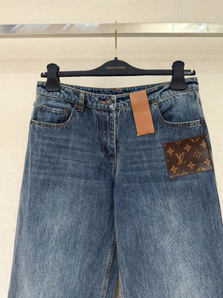 1v monogrammed leather jeans