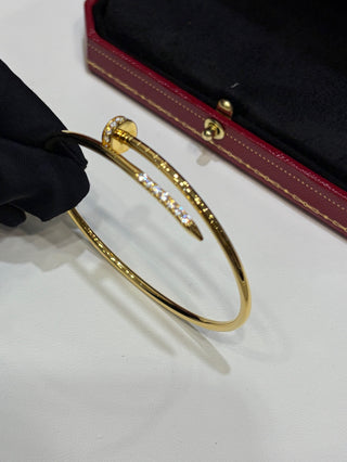 New gold bracelet with rhinestone-studded thin nail design