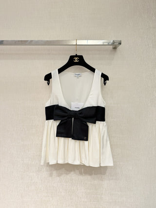 Chane new bow-tie top is made of 100% silk.