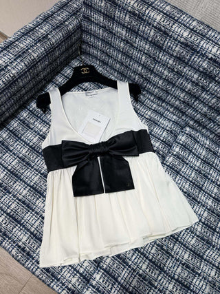 Chane new bow-tie top is made of 100% silk.