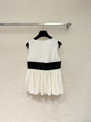 Chane new bow-tie top is made of 100% silk.