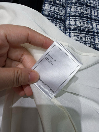 Chane new bow-tie top is made of 100% silk.