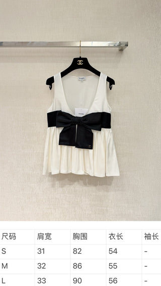 Chane new bow-tie top is made of 100% silk.