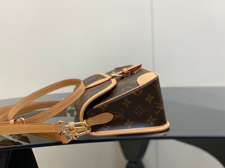 monogrammed leather baguette bag with shoulder strap