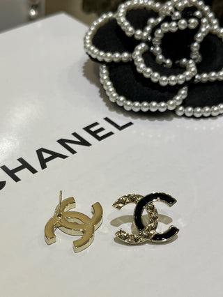 new black and gold enamel diamond pattern double C earrings