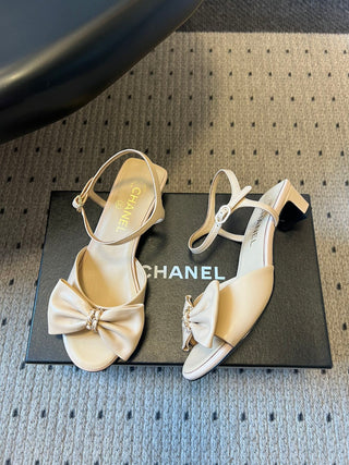 26ss Low-heeled ankle sandals with bow