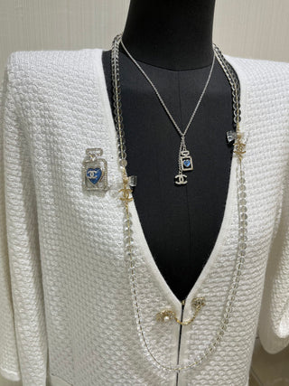 𝑪𝒉𝒂𝒏𝒆 * 25P New Model: Blue Heart with Silver Accents and Full Diamonds – Double C Perfume Bottle Necklace.