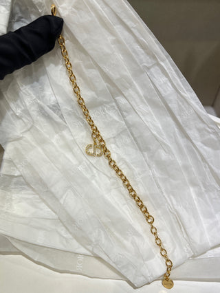 𝐃𝐢𝐨 * 25-year-old, fully encrusted CD pendant in champagne gold with a bracelet.