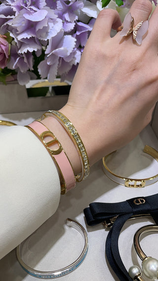 Dio* New Gold CD Letter Pink Enamel Open Bangle