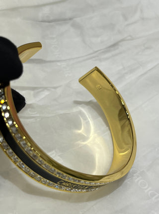 𝐃𝐢𝐨 * 25-year-old, new model, black enamel, gold-plated, letter-patterned, open-faced bracelet.