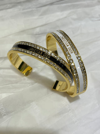 𝐃𝐢𝐨 * 25-year-old, new model, black enamel, gold-plated, letter-patterned, open-faced bracelet.
