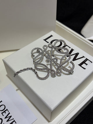 LOEW* 26th-anniversary Anagram Twisted Emblem Silver Brooch