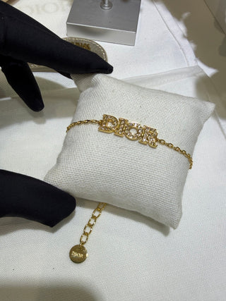𝐃𝐢𝐨 * 26 Spring Early Year New Collection: Gold Bracelet with Full Diamonds and Letters.