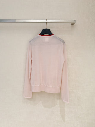 Dio*26’s new pink knit cardigan.