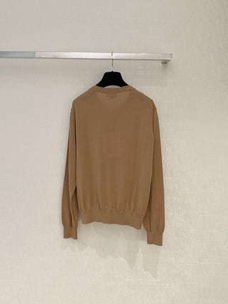 Chane*26’s new lightweight knit cardigan.