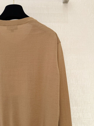 Chane*26’s new lightweight knit cardigan.