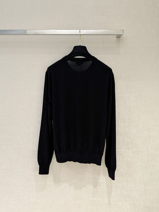 Chane*26’s new lightweight knit cardigan.