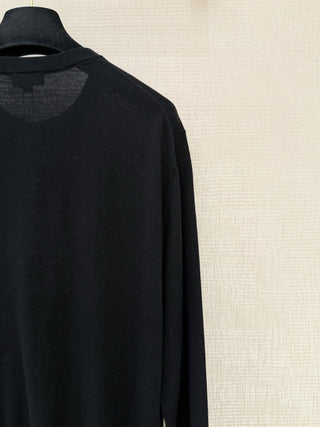 Chane*26’s new lightweight knit cardigan.