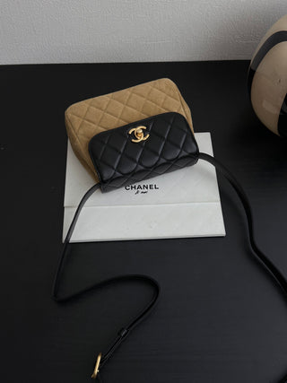 Chanel 25A suede-covered zippered bag