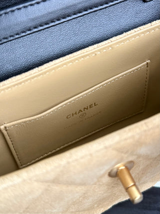 Chanel 25A suede horizontal phone case.