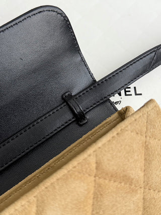 Chanel 25A suede horizontal phone case.