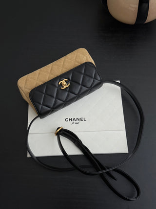 Chanel 25A suede horizontal phone case.