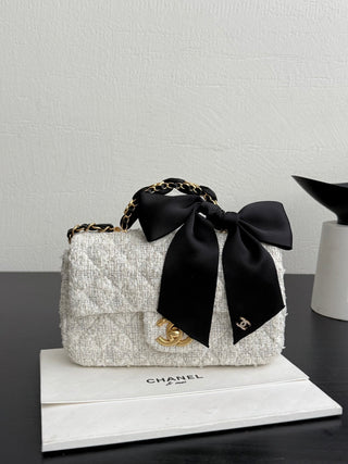 Chanel 25K bow-tie CF handle mini tweed.