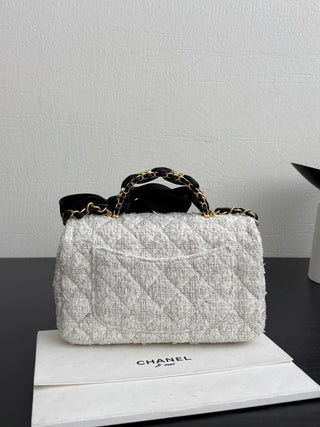 Chanel 25K bow-tie CF handle mini tweed.