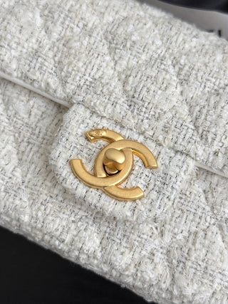 Chanel 25K bow-tie CF handle mini tweed.