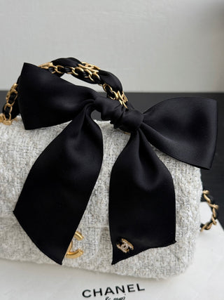 Chanel 25K bow-tie CF handle mini tweed.