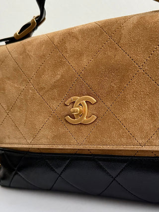 Chanel 25A suede brown messenger bag.