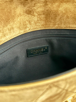 Chanel 25A suede brown messenger bag.