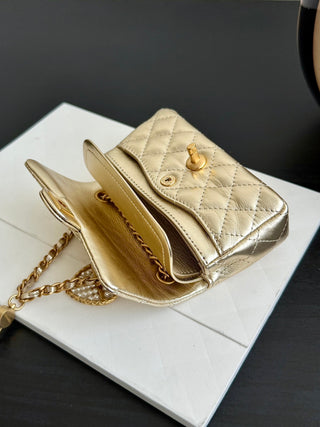 Chanel 25A ultra-mini cf pendant bag, gold color.