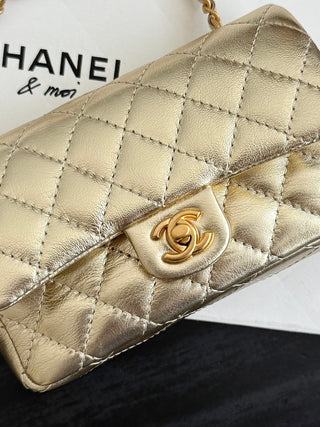 Chanel 25A ultra-mini cf pendant bag, gold color.