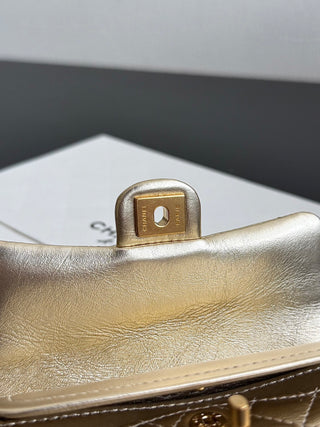 Chanel 25A ultra-mini cf pendant bag, gold color.
